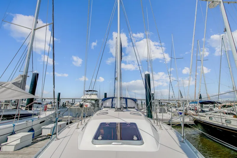  Yacht Photos Pics 2011 Catalina 445 sailboat docked at marina under clear blue sky.