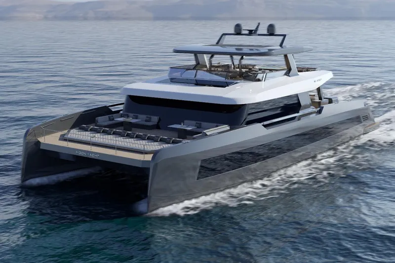  Yacht Photos Pics Luxurious 2027 Moon 9ty yacht cruising on open water, showcasing sleek modern design.