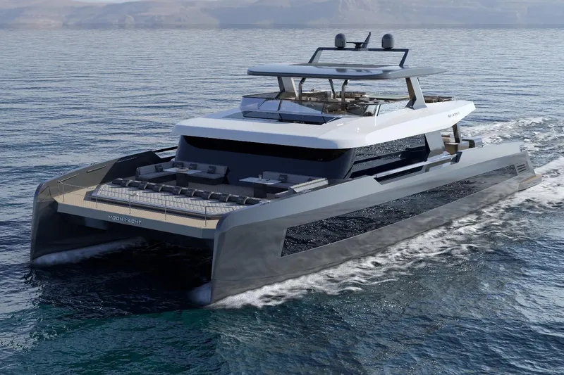  Yacht Photos Pics Luxurious 2027 Moon 9ty yacht cruising on open water, showcasing sleek modern design.