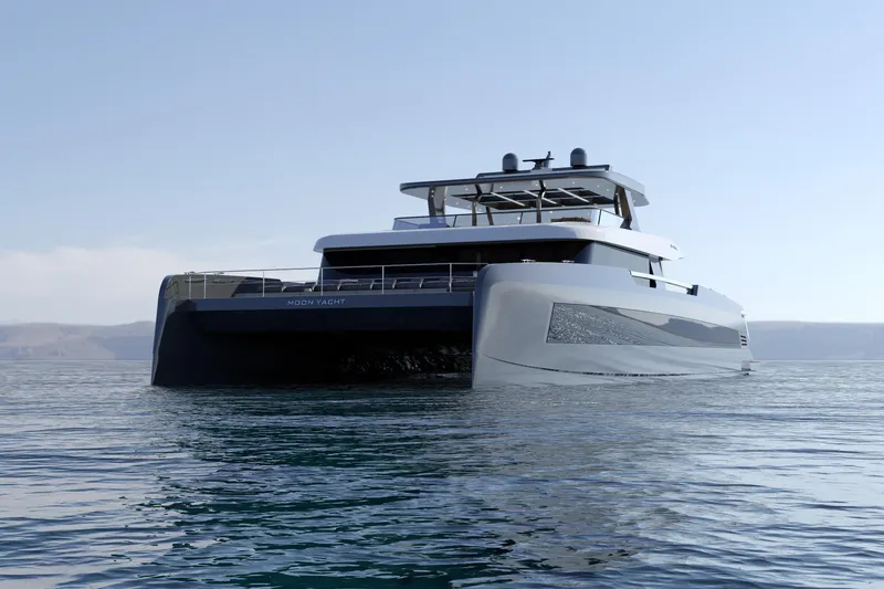  Yacht Photos Pics Luxurious Moon 9ty yacht from 2027 on serene water, showcasing sleek modern design.