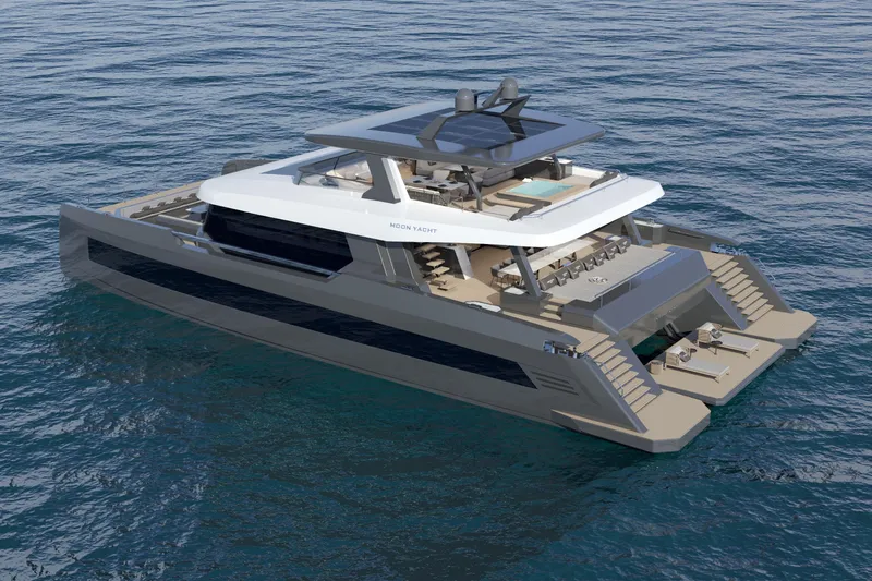  Yacht Photos Pics Luxurious 2027 Moon 9ty yacht on serene ocean waters, showcasing modern design and spacious decks.