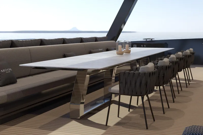  Yacht Photos Pics Luxurious dining area on Moon 9ty yacht, featuring elegant table and chairs, 2027 model.