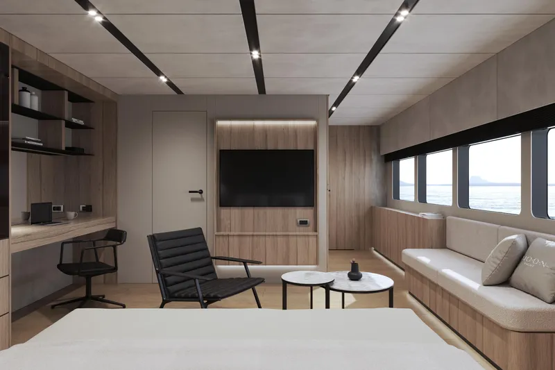  Yacht Photos Pics Luxurious interior of 2027 Moon 9ty yacht with modern furnishings and ocean view.