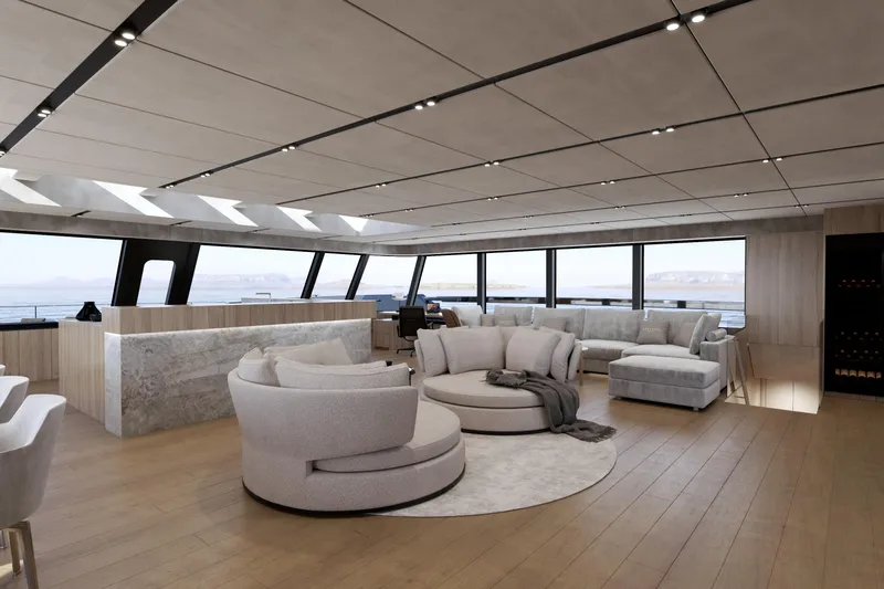  Yacht Photos Pics Luxurious interior of 2027 Moon 9ty yacht with modern seating and panoramic windows.