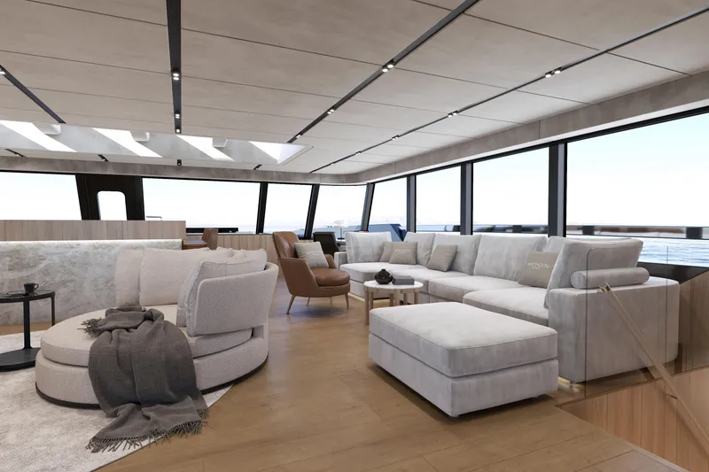  Yacht Photos Pics Luxurious interior of 2027 Moon 9ty yacht with modern seating and panoramic windows.