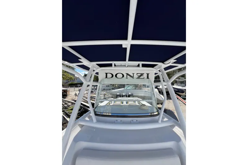  Yacht Photos Pics 2008 Donzi 38 ZFX Open boat with canopy and sleek design.
