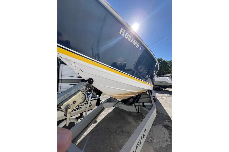  Yacht Photos Pics 2008 Donzi 38 ZFX Open boat on trailer under bright sunlight.