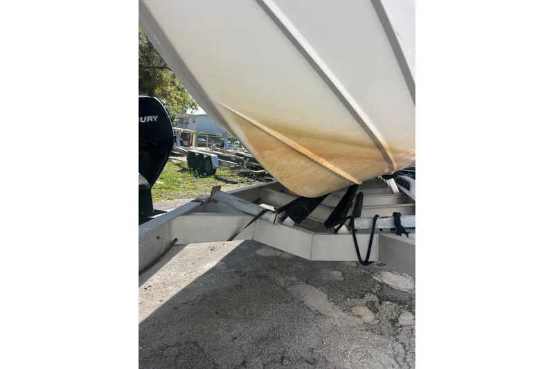  Yacht Photos Pics 2008 Donzi 38 ZFX Open boat on trailer, showing hull and Mercury engine.