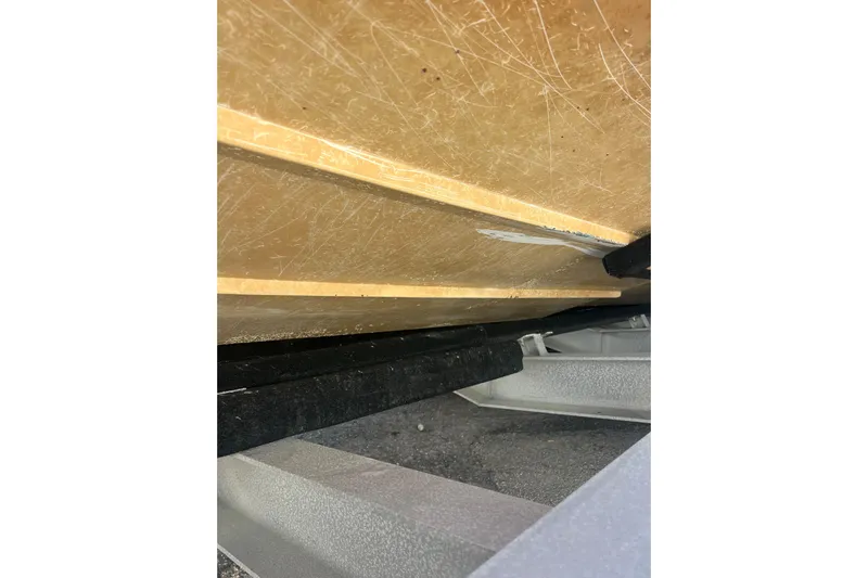  Yacht Photos Pics Close-up of the underside of a 2008 Donzi 38 ZFX Open boat on a trailer.