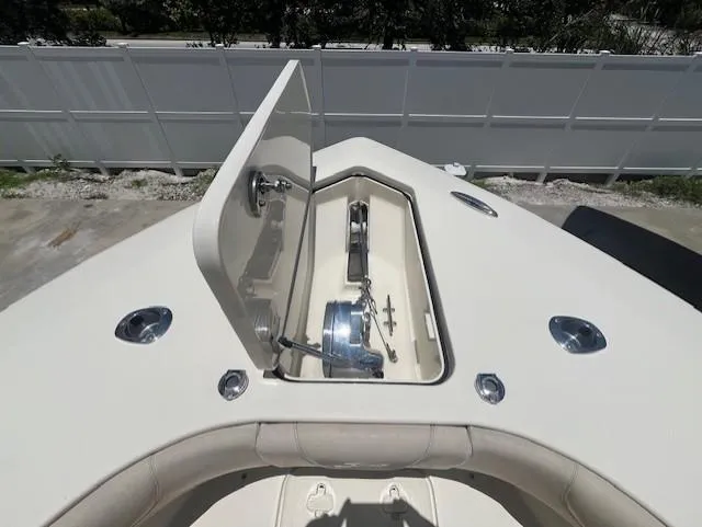  Yacht Photos Pics 2018 Scout 300LXF boat anchor compartment with open hatch, showcasing anchor and chain.