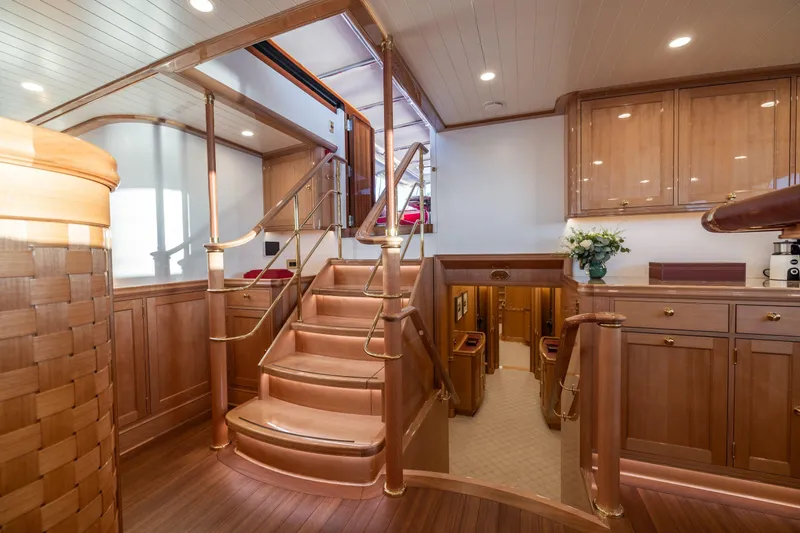 Maximus Yacht Photos Pics Luxurious interior of 2023 Vitters Cruising Ketch with elegant wooden finishes and modern design.