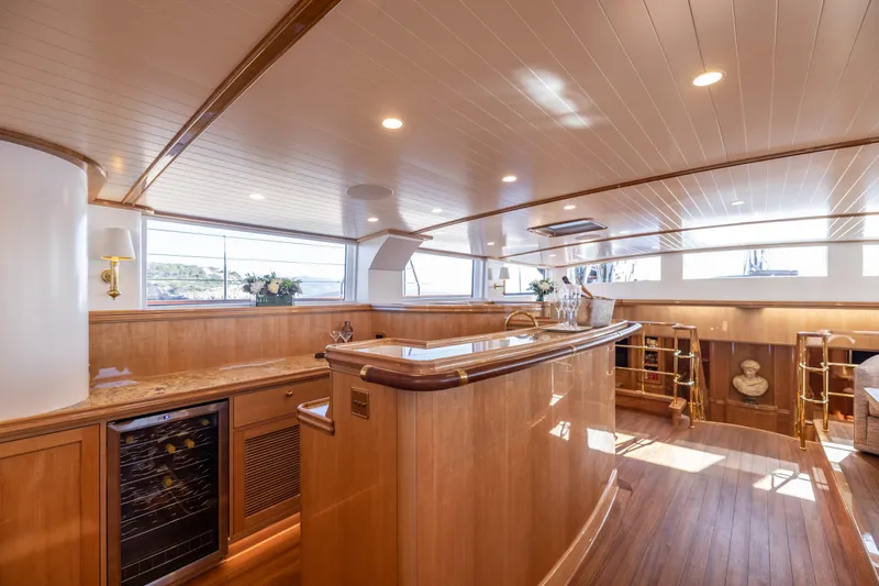 Maximus Yacht Photos Pics Luxurious interior of 2023 Vitters Cruising Ketch with elegant wood finishes and modern amenities.