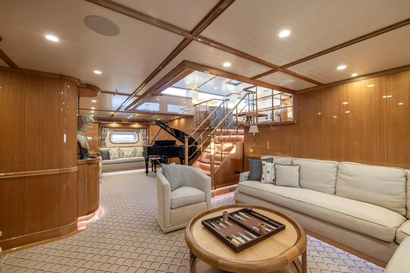 Maximus Yacht Photos Pics Luxurious interior of 2023 Vitters Cruising Ketch with elegant wood finishes and modern furnishings.
