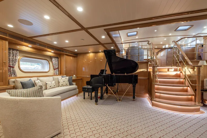 Maximus Yacht Photos Pics Luxurious 2023 Vitters Cruising Ketch interior with grand piano and elegant staircase.