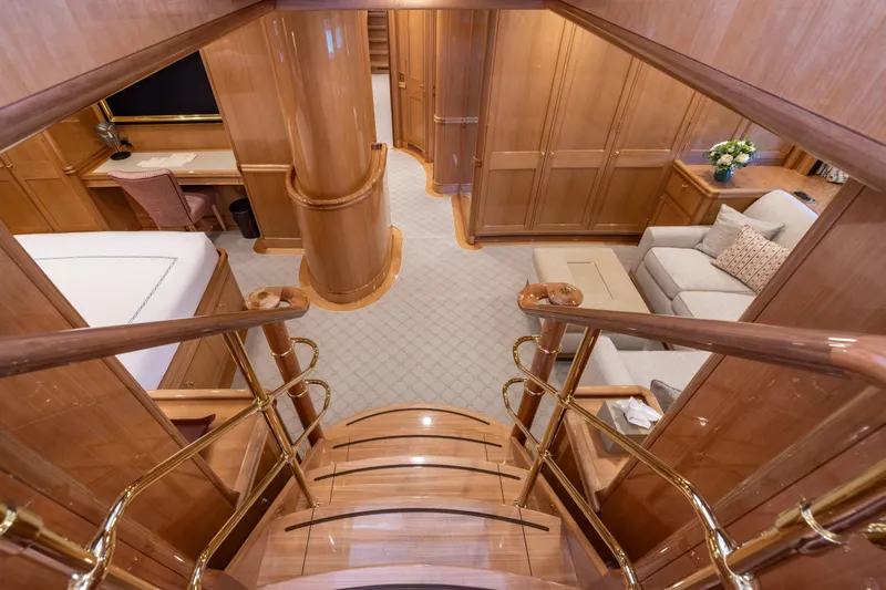 Maximus Yacht Photos Pics Luxurious interior of 2023 Vitters Cruising Ketch with elegant wood finish and plush seating.