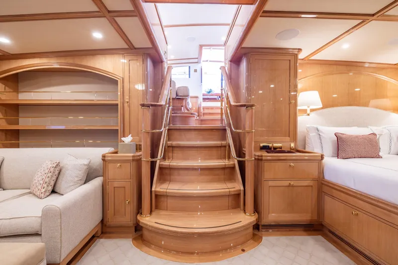Maximus Yacht Photos Pics Luxurious interior of 2023 Vitters Cruising Ketch with elegant wood finish and cozy furnishings.