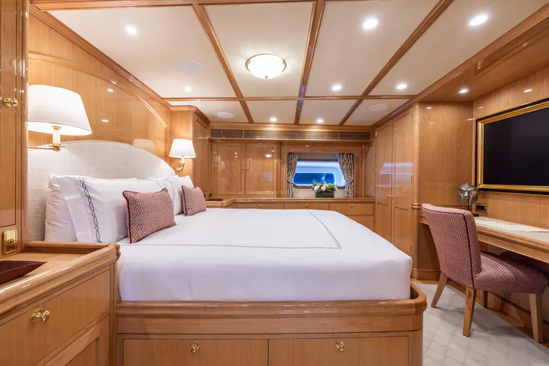 Maximus Yacht Photos Pics Luxurious 2023 Vitters Cruising Ketch cabin with elegant wood finish and plush bedding.
