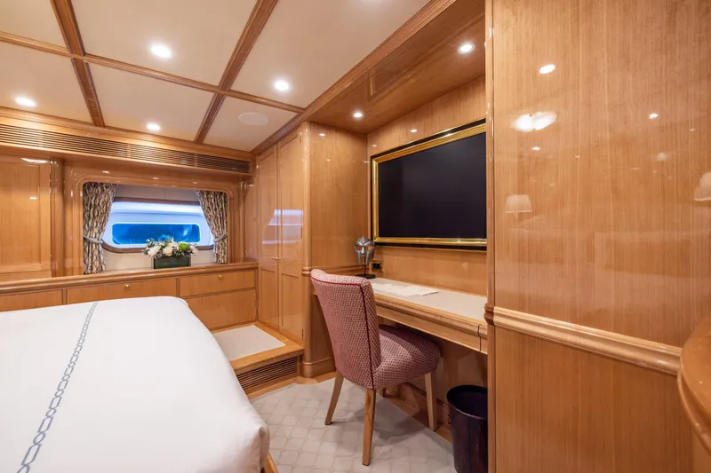 Maximus Yacht Photos Pics Luxurious cabin interior of 2023 Vitters Cruising Ketch with elegant wood finish and desk area.