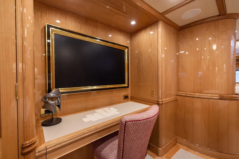 Maximus Yacht Photos Pics Luxurious wooden interior of 2023 Vitters Cruising Ketch with desk and mounted TV.