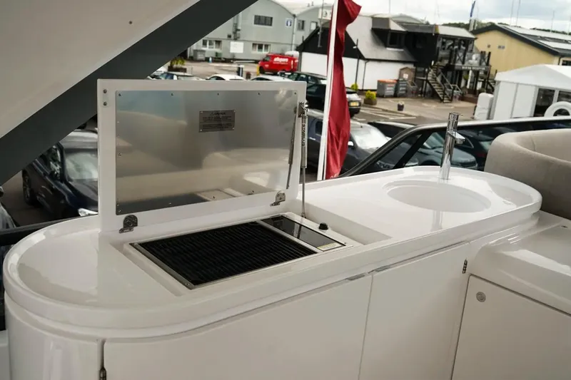  Yacht Photos Pics Outdoor kitchen on 2024 Azimut Fly 68 yacht with grill and sink.