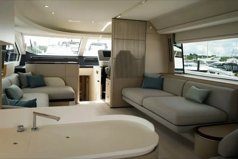  Yacht Photos Pics Luxurious interior of 2024 Azimut Fly 68 yacht with modern seating and large windows.