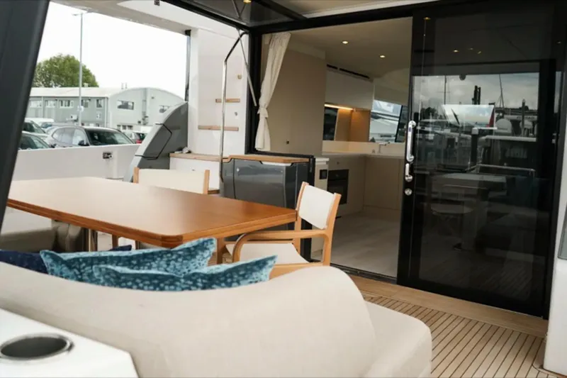  Yacht Photos Pics Luxurious interior of 2024 Azimut Fly 68 yacht with elegant dining area.