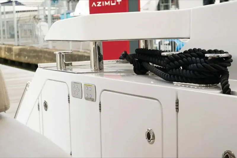  Yacht Photos Pics 2024 Azimut Fly 68 yacht deck with mooring ropes and control panel.