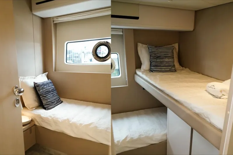  Yacht Photos Pics 2024 Azimut Fly 68 yacht interior cabin with twin beds and modern decor.
