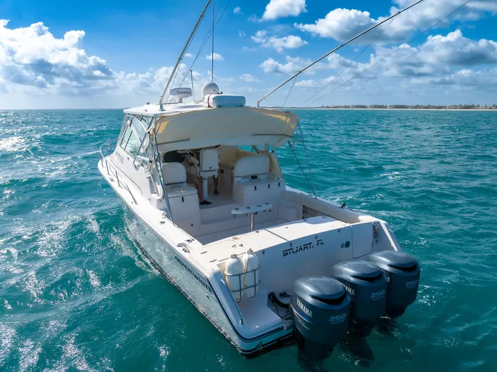  Yacht Photos Pics 2007 Grady-White Express 360 boat on open sea under a clear blue sky.