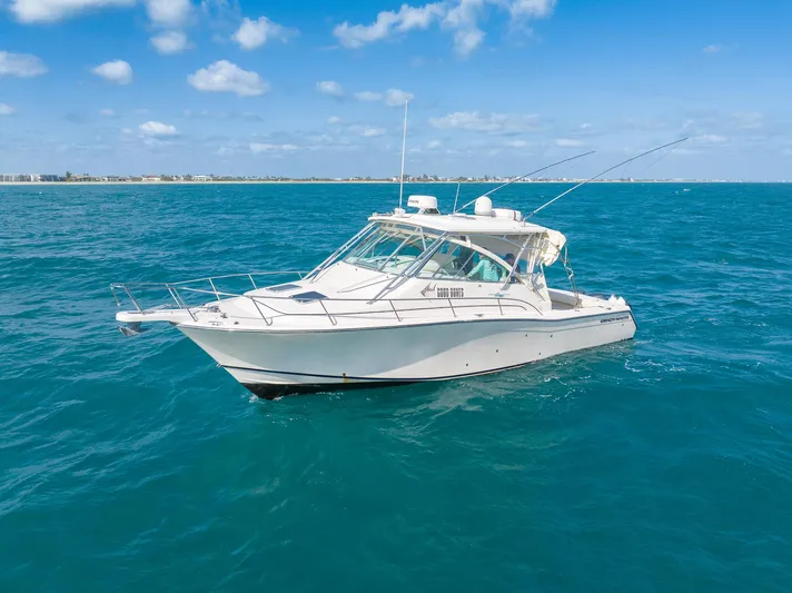  Yacht Photos Pics 2007 Grady-White Express 360 boat on open sea under clear blue sky.