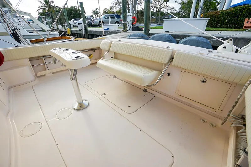  Yacht Photos Pics 2007 Grady-White Express 360 boat deck with seating and table, docked at marina.