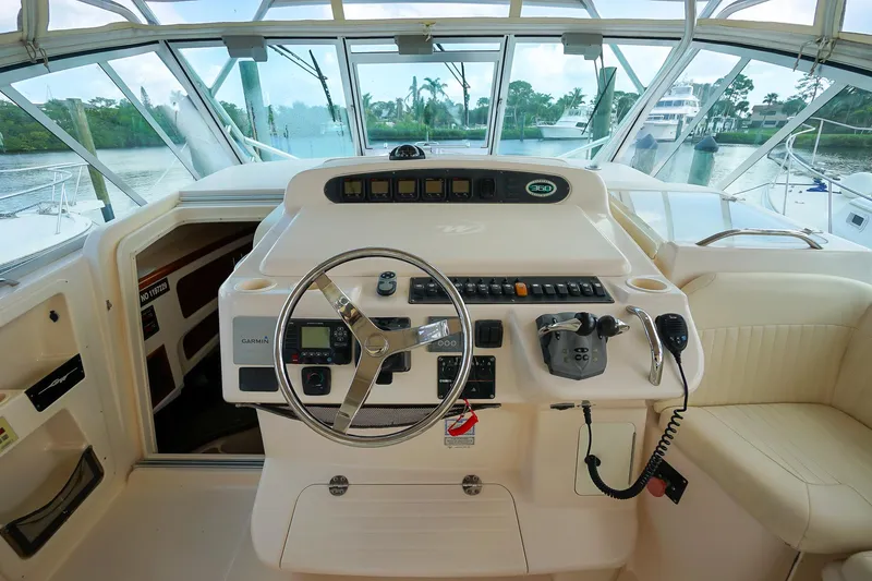  Yacht Photos Pics 2007 Grady-White Express 360 helm with steering wheel and control panel.