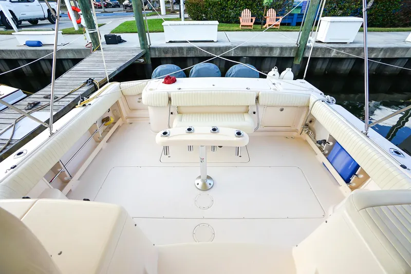  Yacht Photos Pics 2007 Grady-White Express 360 boat interior with seating and table, docked at marina.