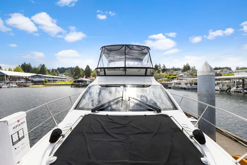  Yacht Photos Pics 2017 Sea Ray 400 Fly yacht docked at marina under clear blue sky.