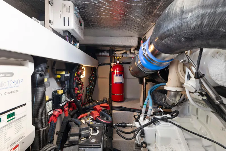  Yacht Photos Pics Engine room of 2017 Sea Ray 400 Fly with fire extinguisher and electrical components.