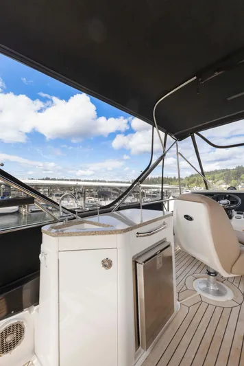  Yacht Photos Pics 2017 Sea Ray 400 Fly yacht interior with sleek design and marina view.
