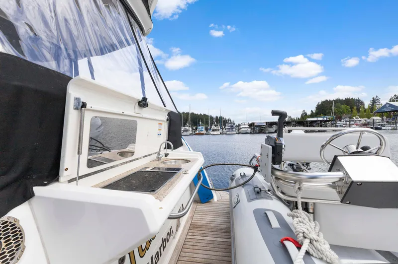  Yacht Photos Pics Sea Ray 400 Fly 2017 yacht docked with inflatable boat, scenic marina view.