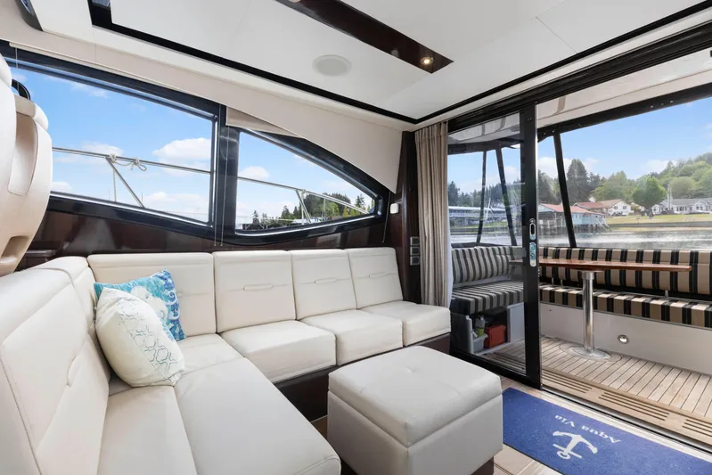  Yacht Photos Pics Luxurious interior of 2017 Sea Ray 400 Fly yacht with plush seating and scenic views.