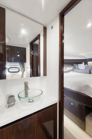  Yacht Photos Pics Luxurious bathroom and bedroom interior of 2017 Sea Ray 400 Fly yacht.