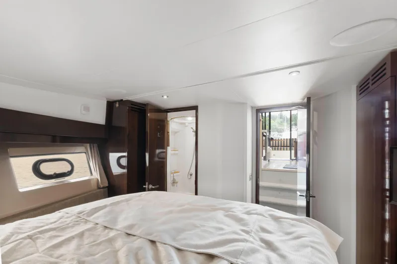  Yacht Photos Pics Luxurious bedroom interior of 2017 Sea Ray 400 Fly yacht with modern design.