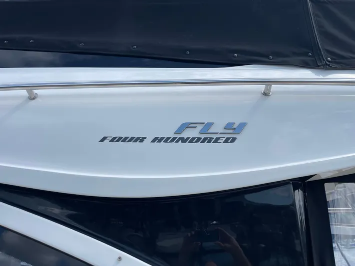  Yacht Photos Pics 2017 Sea Ray 400 Fly yacht with "Fly Four Hundred" branding on the side.