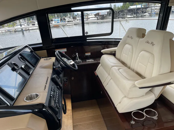  Yacht Photos Pics Interior of 2017 Sea Ray 400 Fly yacht with leather seating and modern dashboard.