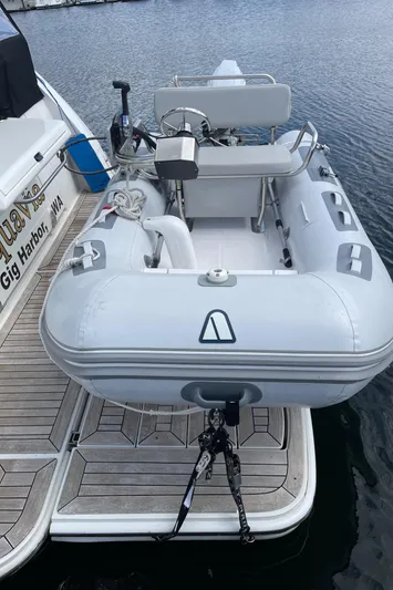 Yacht Photos Pics Inflatable dinghy docked beside a 2017 Sea Ray 400 Fly yacht.