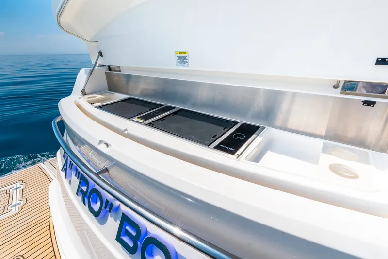 A Ro Boat Yacht Photos Pics Riviera 4800 Sport Yacht 2019 with outdoor grill and ocean view.