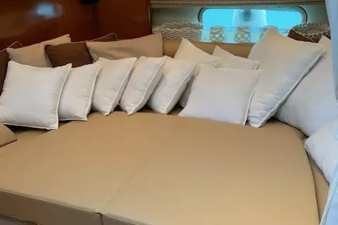  Yacht Photos Pics Luxurious interior seating with cushions on 2009 Jeanneau Prestige 50 HT yacht.