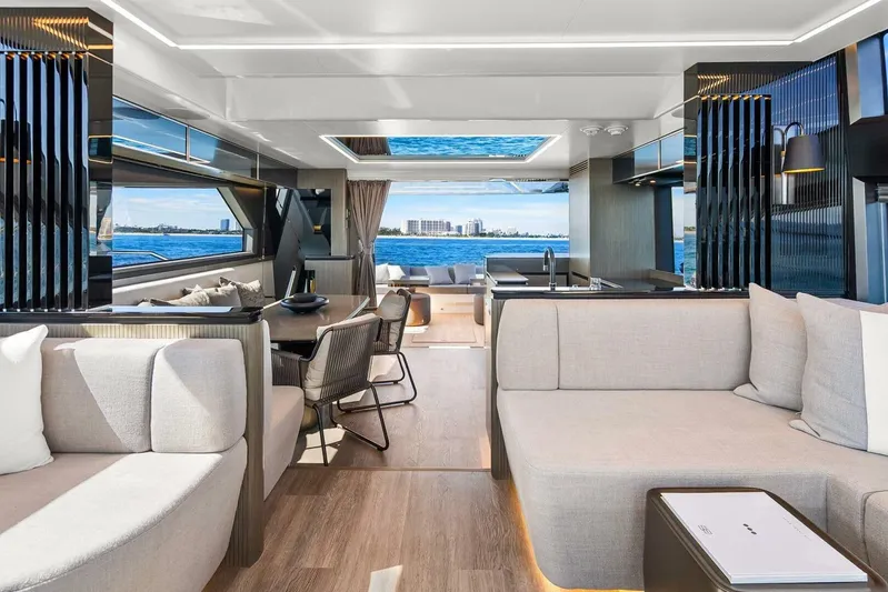  Yacht Photos Pics Luxurious interior of 2025 Pearl 63 yacht with modern design and ocean view.