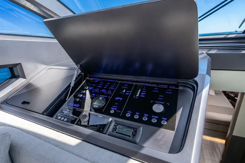  Yacht Photos Pics Control panel of 2025 Pearl 63 yacht, featuring advanced navigation and system controls.
