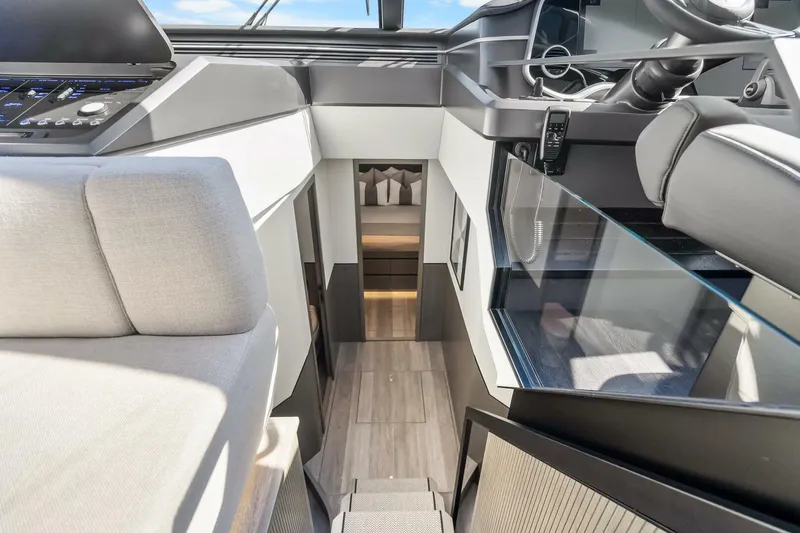  Yacht Photos Pics Interior of 2025 Pearl 63 yacht, featuring modern design and luxurious seating.