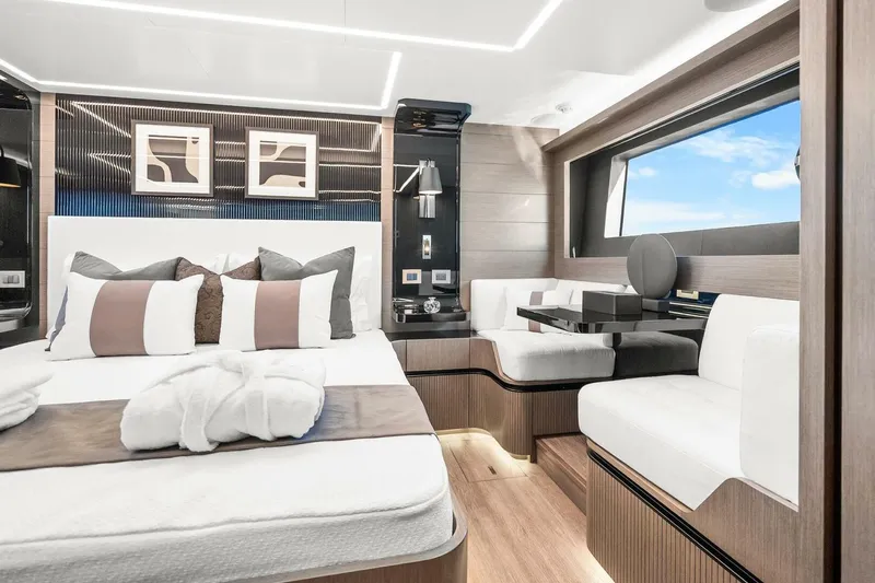 Yacht Photos Pics Luxurious interior of 2025 Pearl 63 yacht with modern decor and comfortable seating.