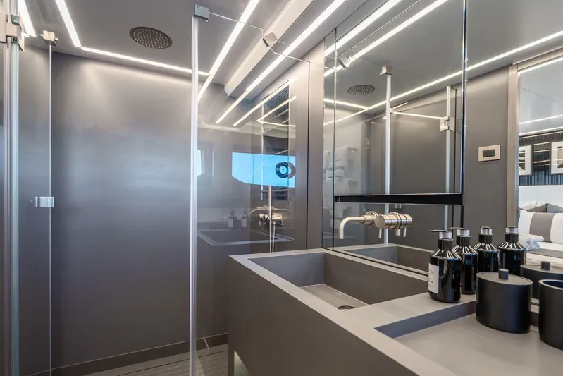  Yacht Photos Pics Modern bathroom interior in Pearl 63 yacht, 2025 model, featuring sleek design and ambient lighting.